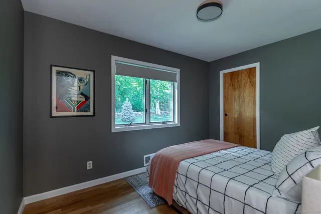 a workspace with furniture and a window