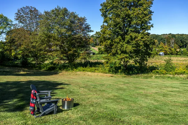 a view of a lake with a yard