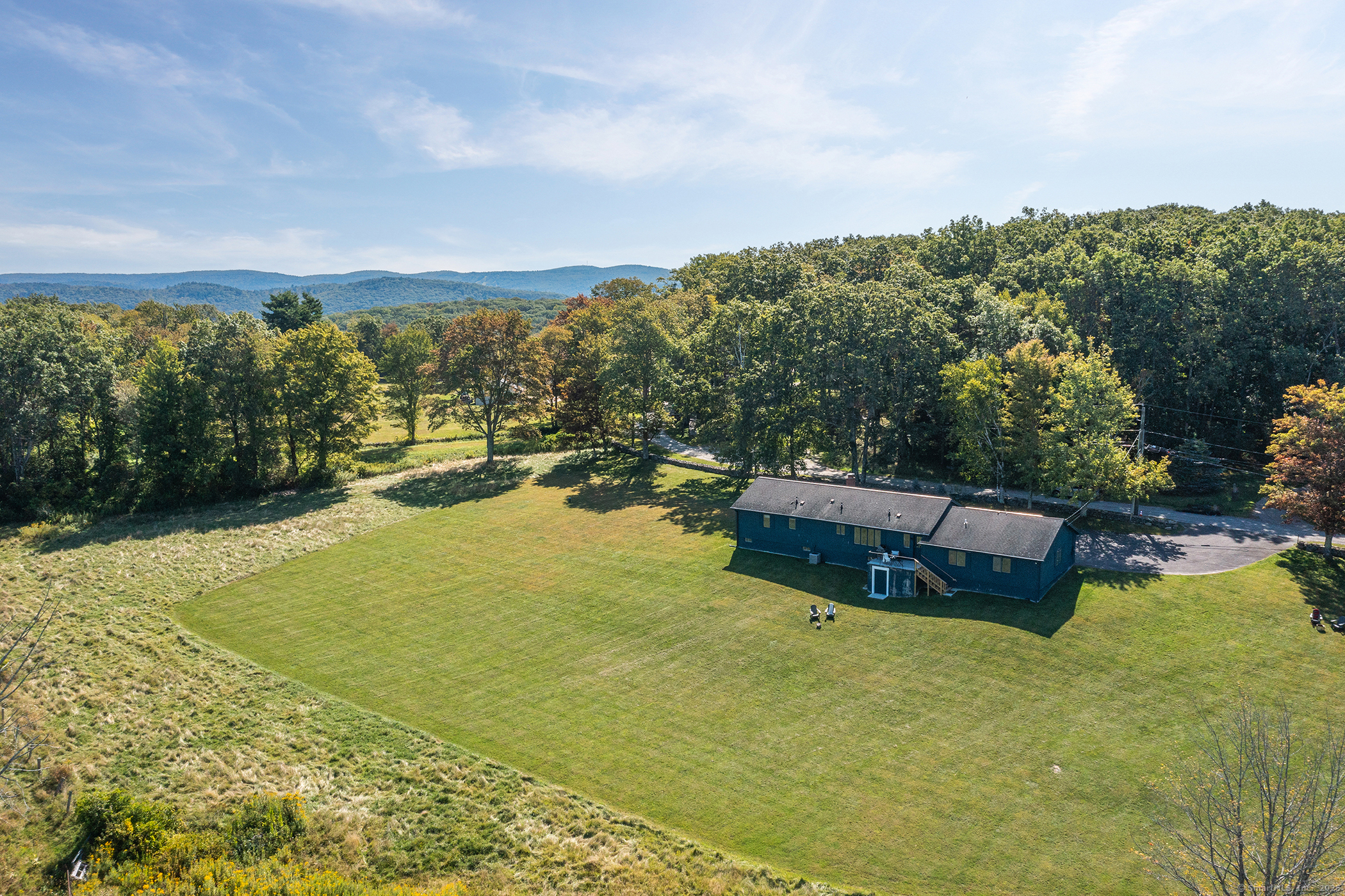 10 Surdan Mountain Road Sharon, CT 06069 - Photo 26 of 31 a view of a lake with a yard
