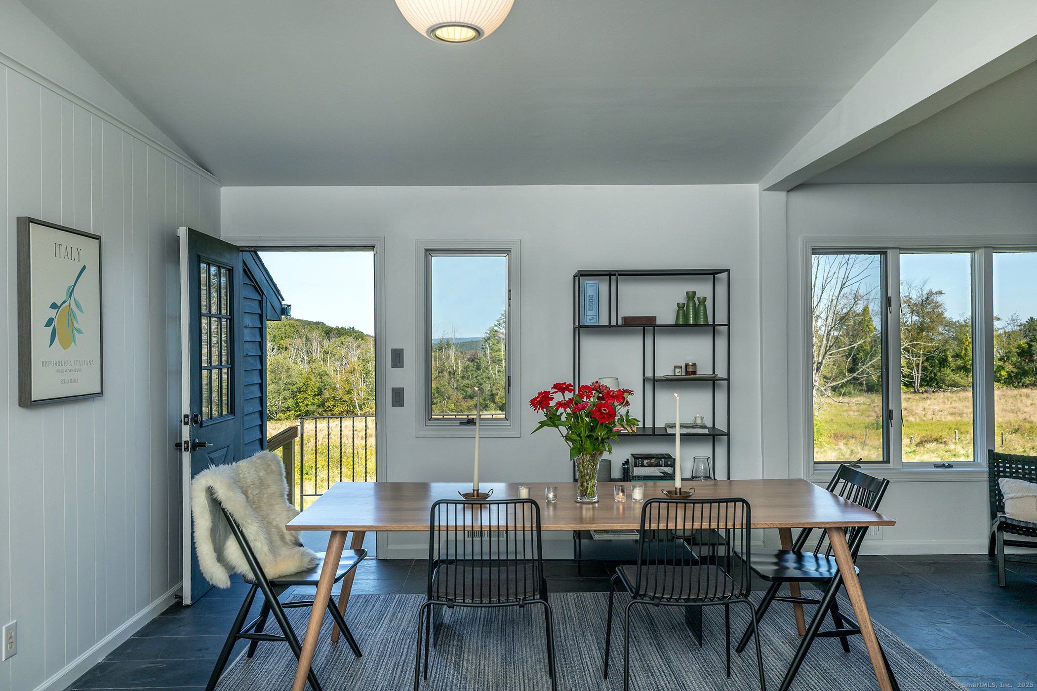 10 Surdan Mountain Road Sharon, CT 06069 - Photo 6 of 31 a view of a dining room with furniture and window