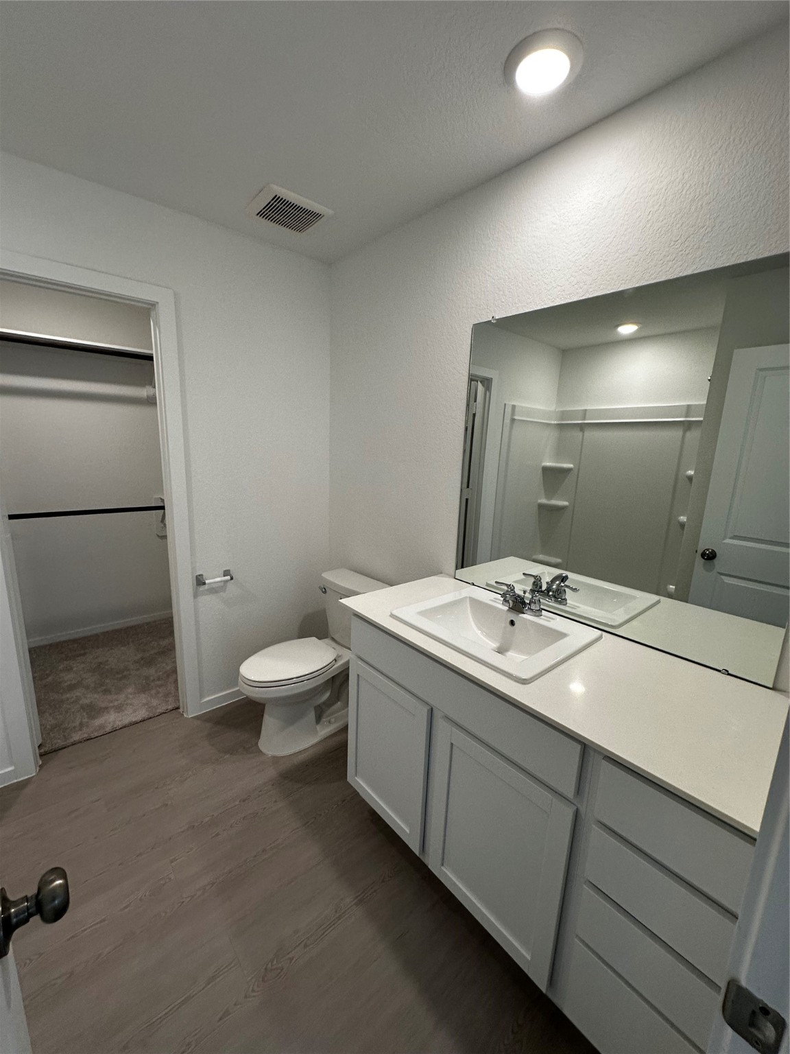 478 Southern Magnolia Way Magnolia, TX 77354 - Photo 12 of 28 a bathroom with a toilet sink and mirror