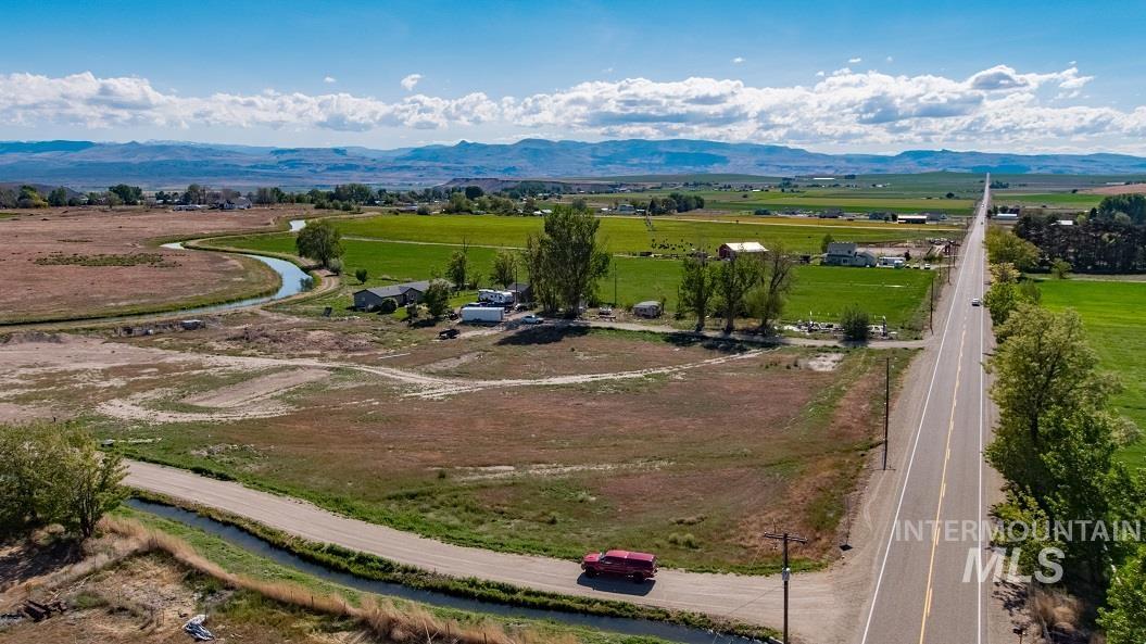 Cs Melba Road Melba, ID 83641 - Photo 9 of 12 Aerial view of sparsely populated area with a mountainous background