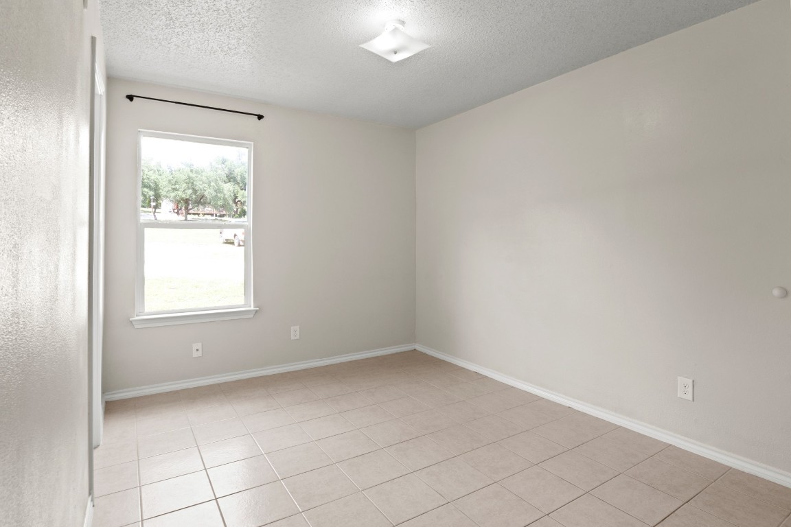 23393 Nameless Road, Unit 160 Leander, TX 78641 - Photo 15 of 20 an empty room with a window