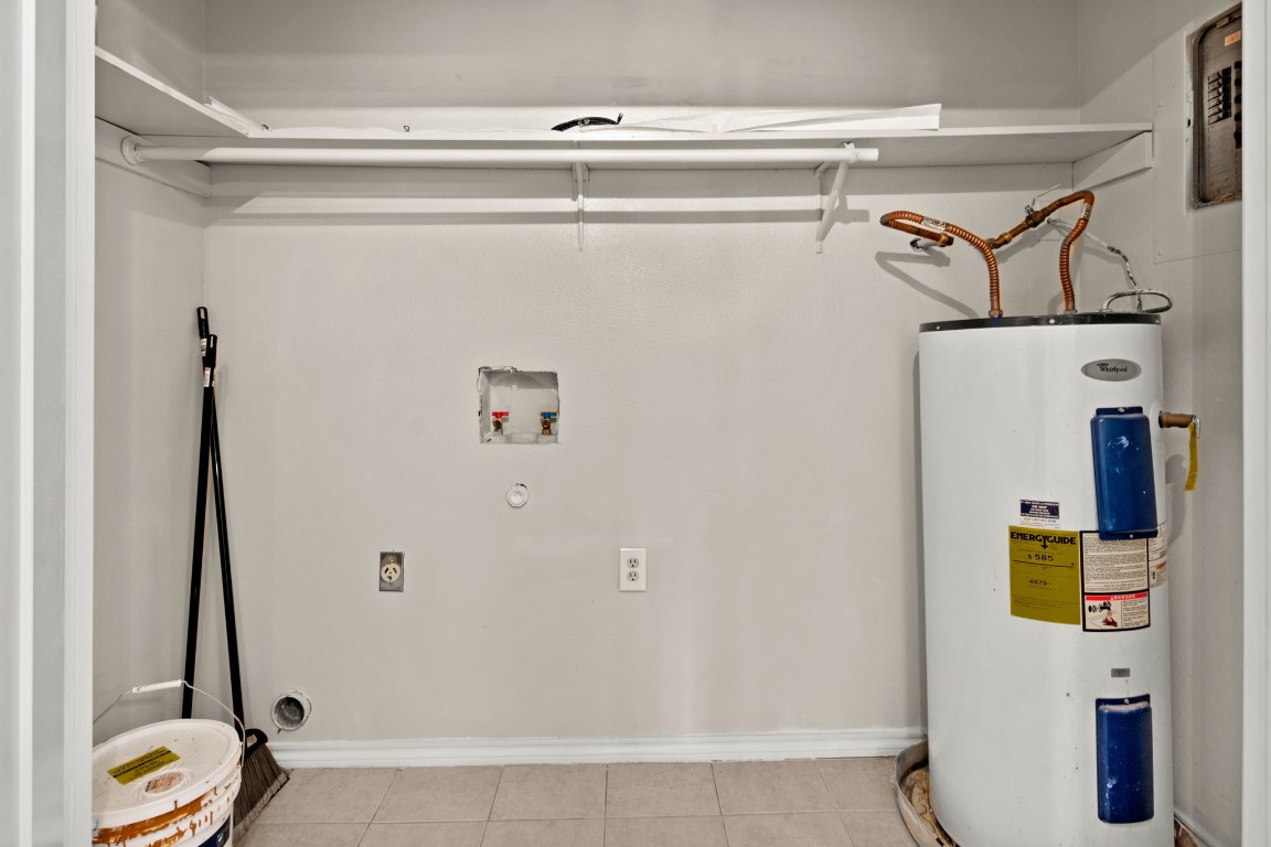23393 Nameless Road, Unit 160 Leander, TX 78641 - Photo 18 of 20 a view of walk in closet with clothes and shoes
