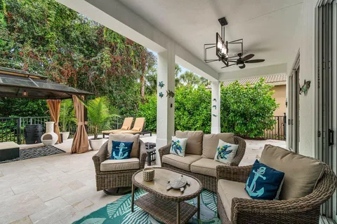a outdoor living space with furniture and garden view