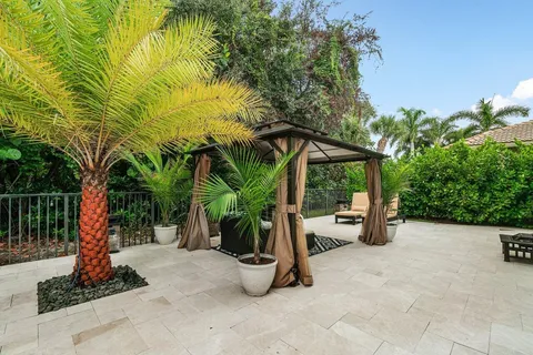 a view of backyard with a slide