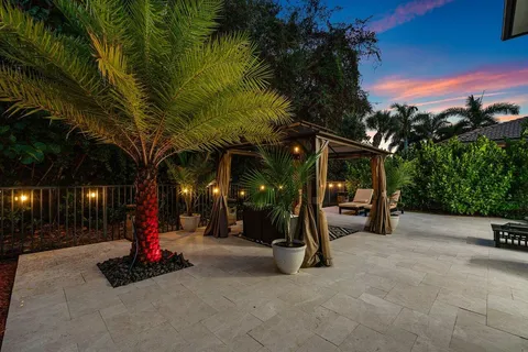 a view of a park with swings and slides