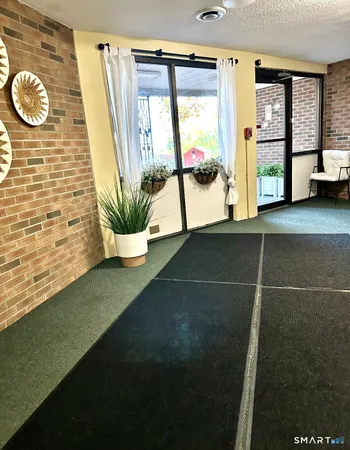 a view of a living room and a window