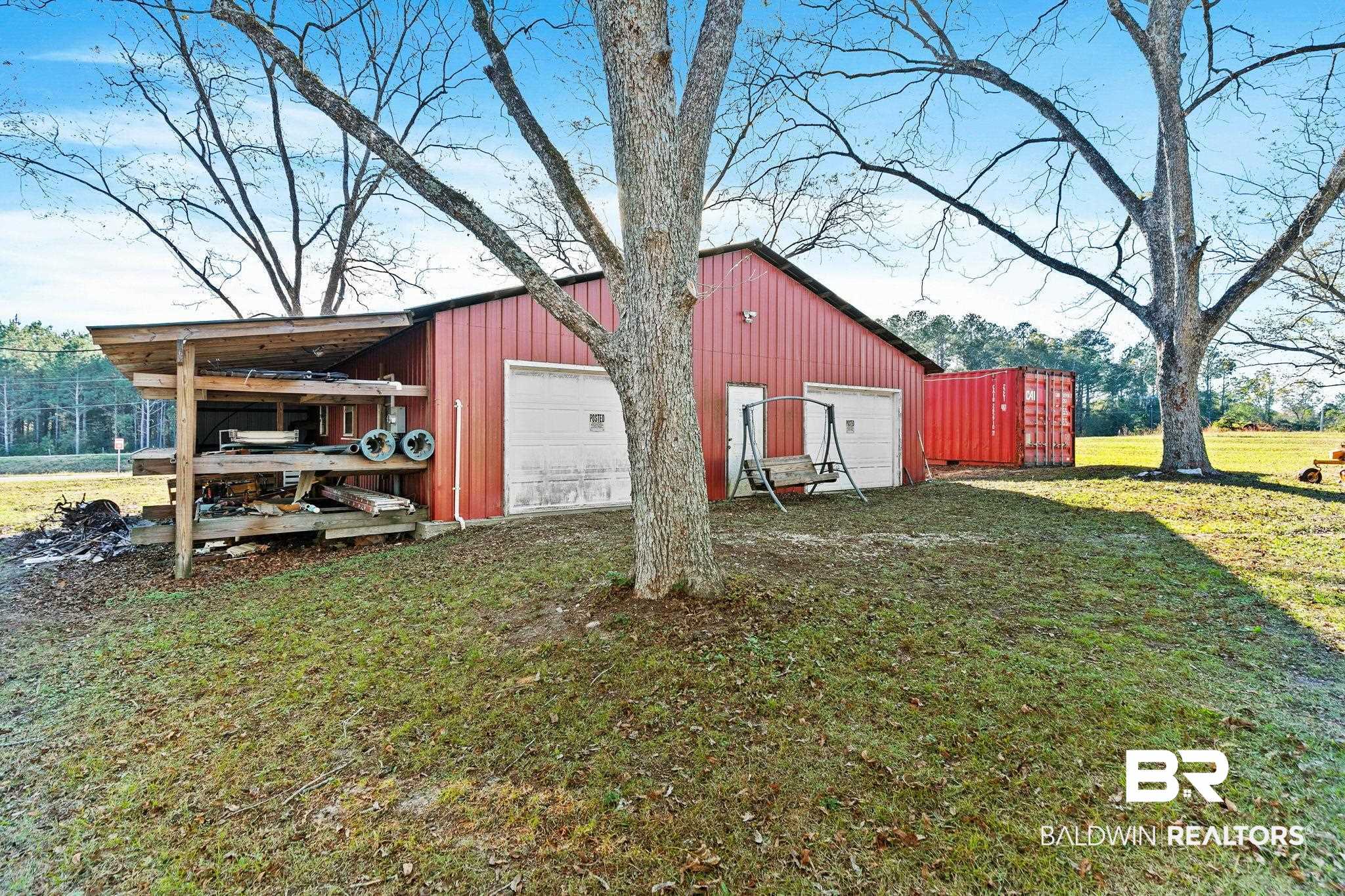 21267 Loop Road Andalusia, AL 36421 - Photo 61 of 72 View of pole building featuring a lawn