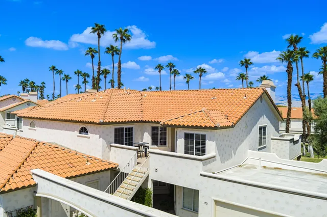 a view of a house with a swimming pool