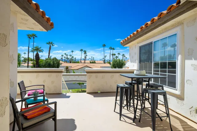 a view of house with a swimming pool