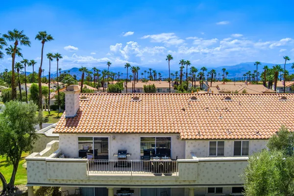swimming pool view with a outdoor seating