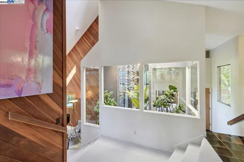 a kitchen with a table and chairs in it