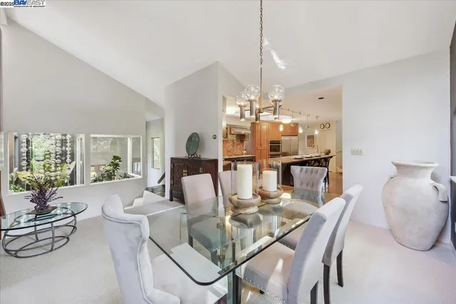a kitchen with a sink and wooden cabinets