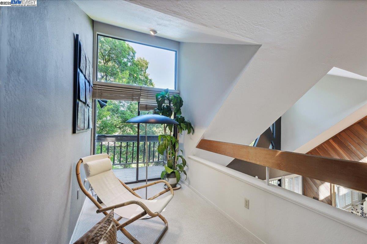 391 Oak Lane Pleasanton, CA 94566 - Photo 19 of 60 a balcony with a table and chairs