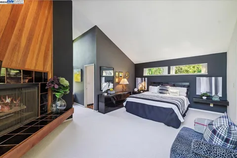 a view of balcony with deck and wooden floor