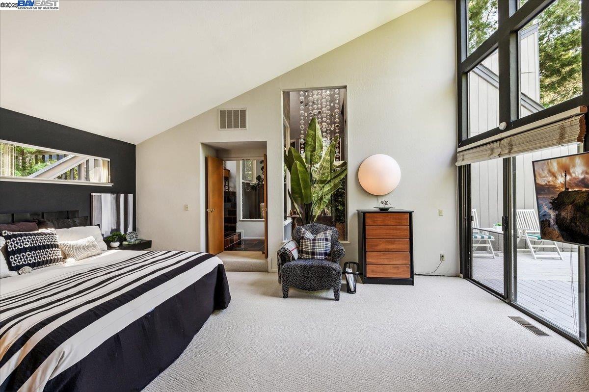 391 Oak Lane Pleasanton, CA 94566 - Photo 36 of 60 a living room with furniture and a flat screen tv