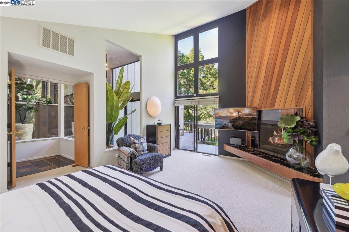 391 Oak Lane Pleasanton, CA 94566 - Photo 37 of 60 a bedroom with furniture and a window