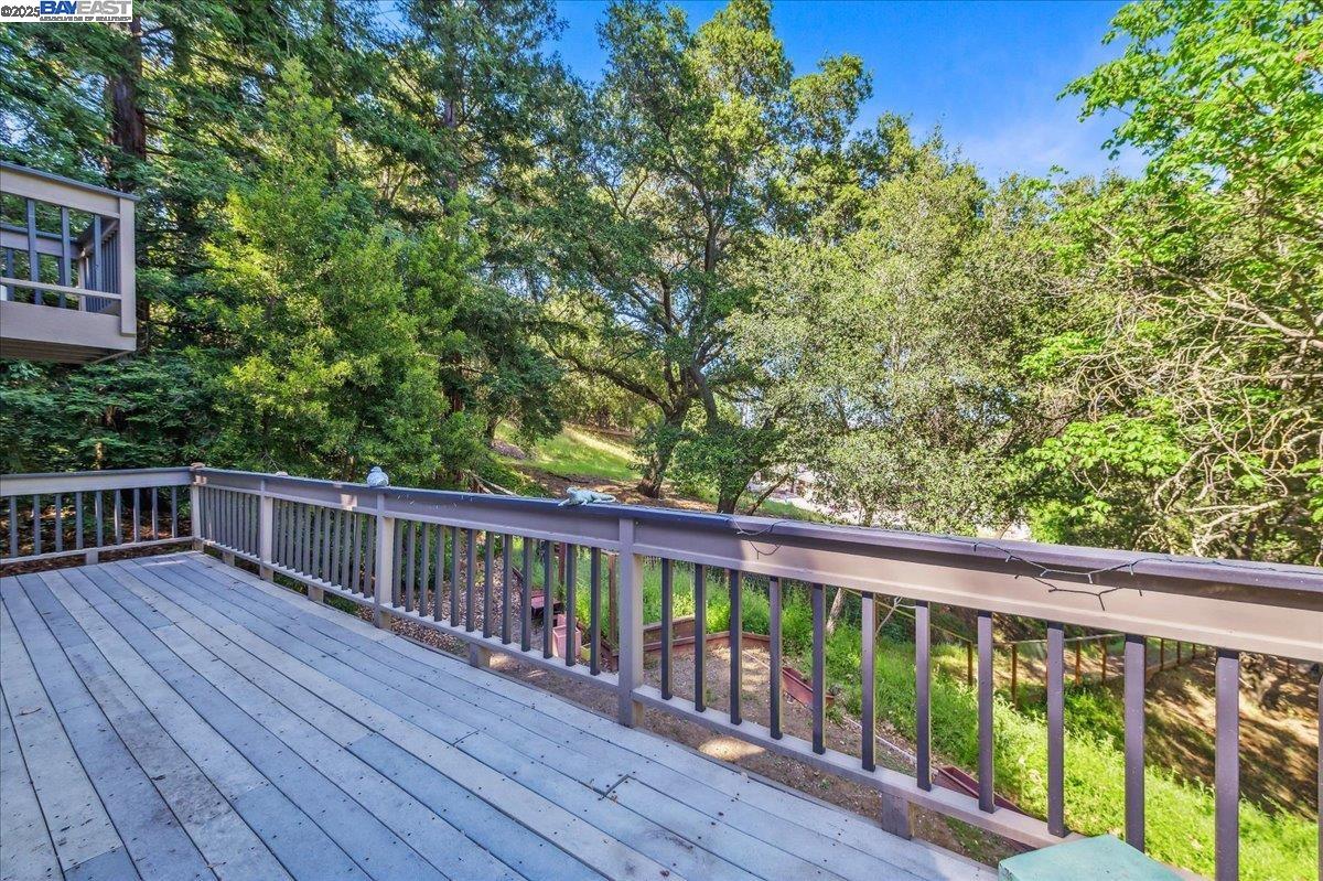 391 Oak Lane Pleasanton, CA 94566 - Photo 43 of 60 a view of balcony with deck and wooden floor