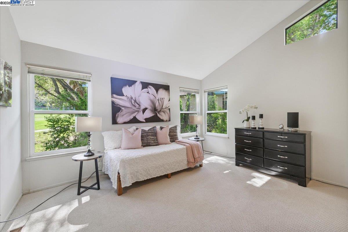 391 Oak Lane Pleasanton, CA 94566 - Photo 48 of 60 a bedroom with a bed and a window