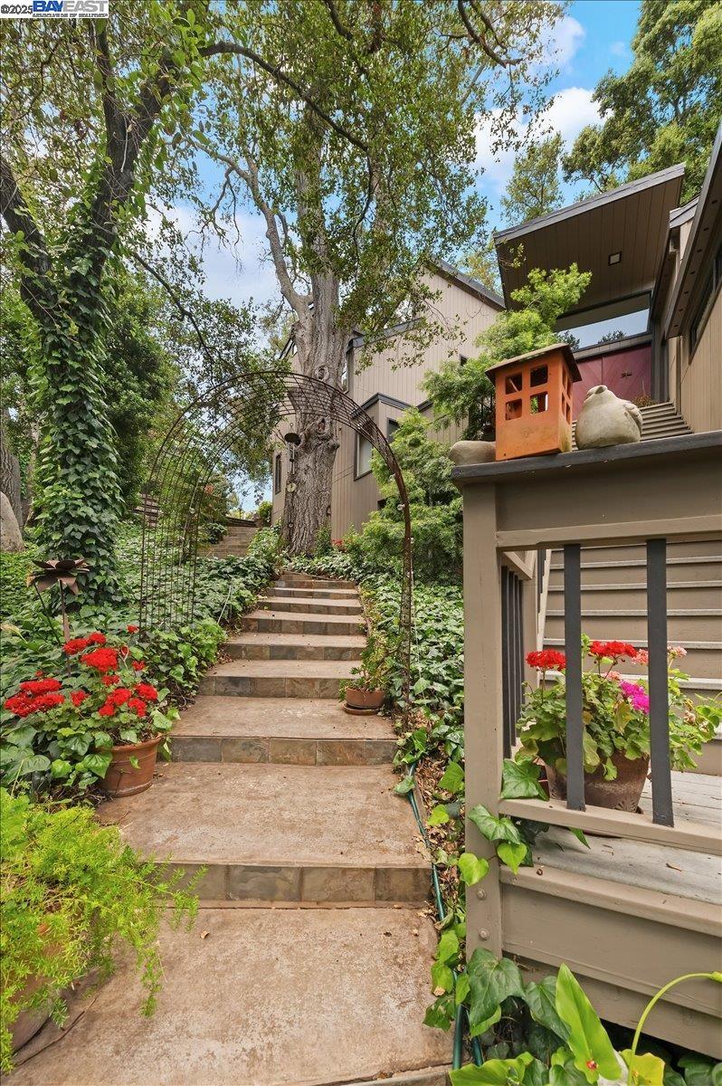 391 Oak Lane Pleasanton, CA 94566 - Photo 5 of 60 a view of sign board with flower plants