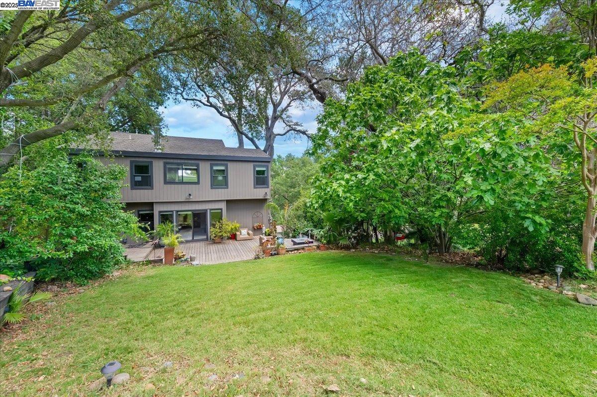 391 Oak Lane Pleasanton, CA 94566 - Photo 58 of 60 a view of a house with a yard and sitting area