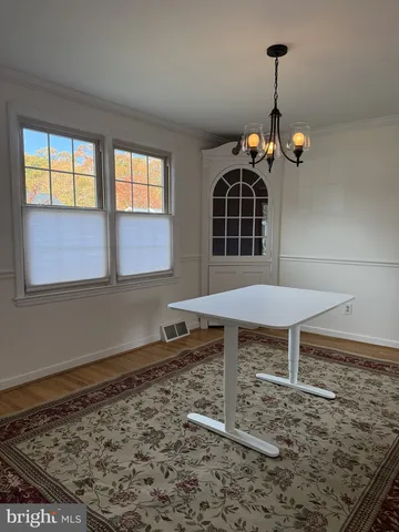 a view of a livingroom with furniture