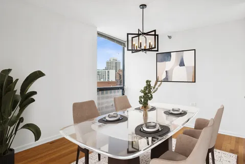a view of a dining room with furniture