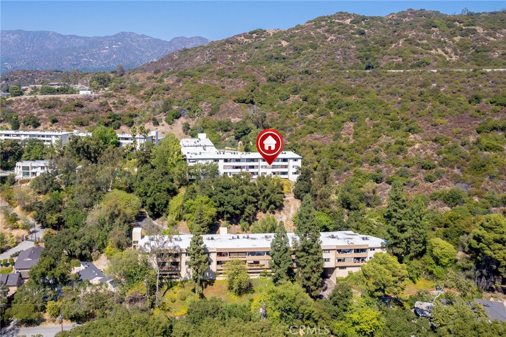 1935 Alpha Road, Unit 214 Glendale, CA 91208 - Photo 29 of 29 a view of a lot of trees and mountains