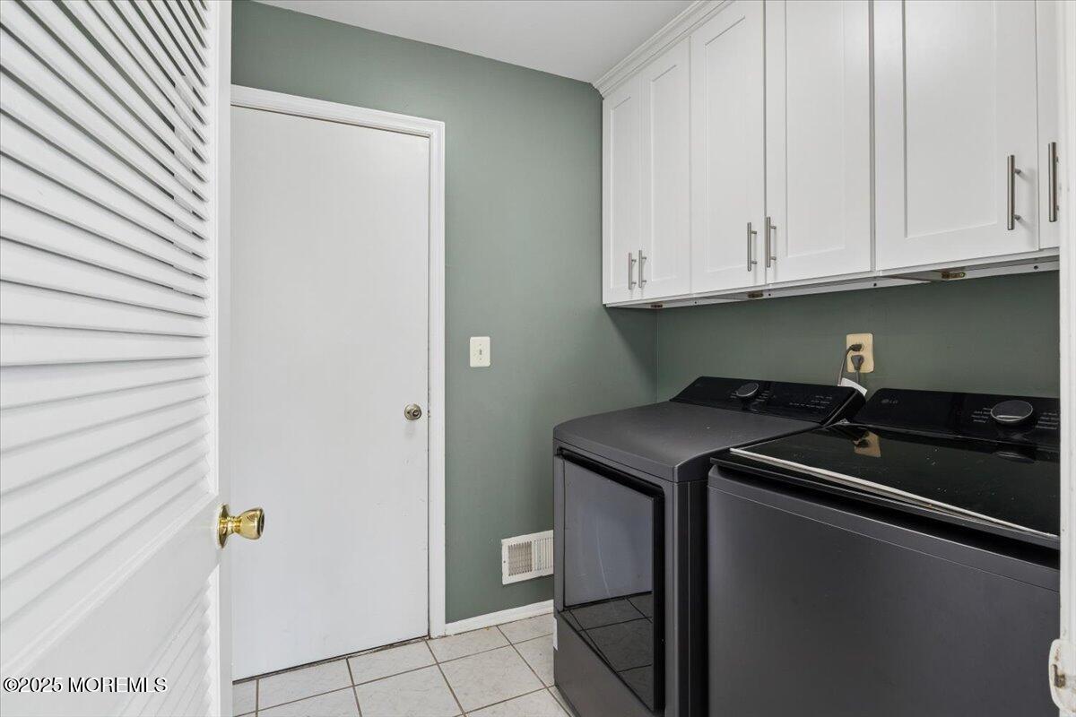 2 Higgins Court Howell, NJ 07731 - Photo 20 of 49 a utility room with dryer and washer