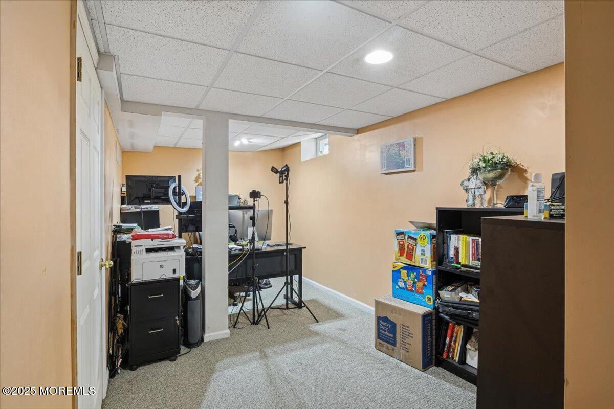 2 Higgins Court Howell, NJ 07731 - Photo 40 of 49 a room with furniture and a book shelf