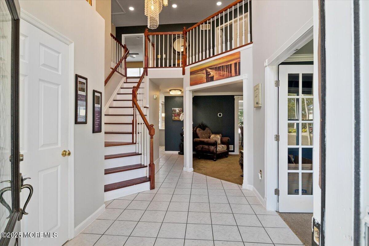 2 Higgins Court Howell, NJ 07731 - Photo 7 of 49 a view of entryway livingroom and hall with wooden floor