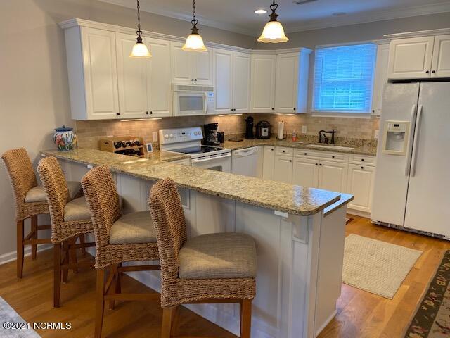 581 River Ridge Road, Unit 4 Shallotte, NC 28470 - Photo 8 of 50 You can charge admission to your friends who will watch you whip up your magic in the kitchen!