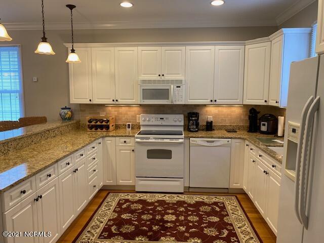 581 River Ridge Road, Unit 4 Shallotte, NC 28470 - Photo 9 of 50 Tons of counter space throughout the kitchen