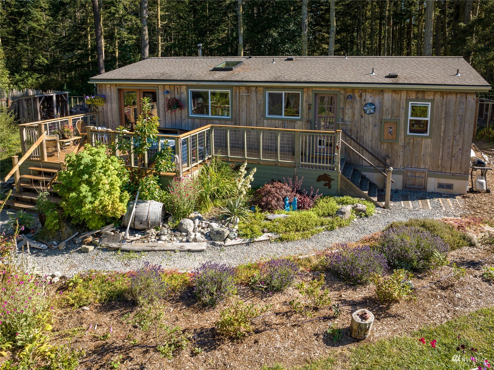 268 Wren Road Lopez Island, WA 98261 - Photo 18 of 23 a view of a house with wooden fence