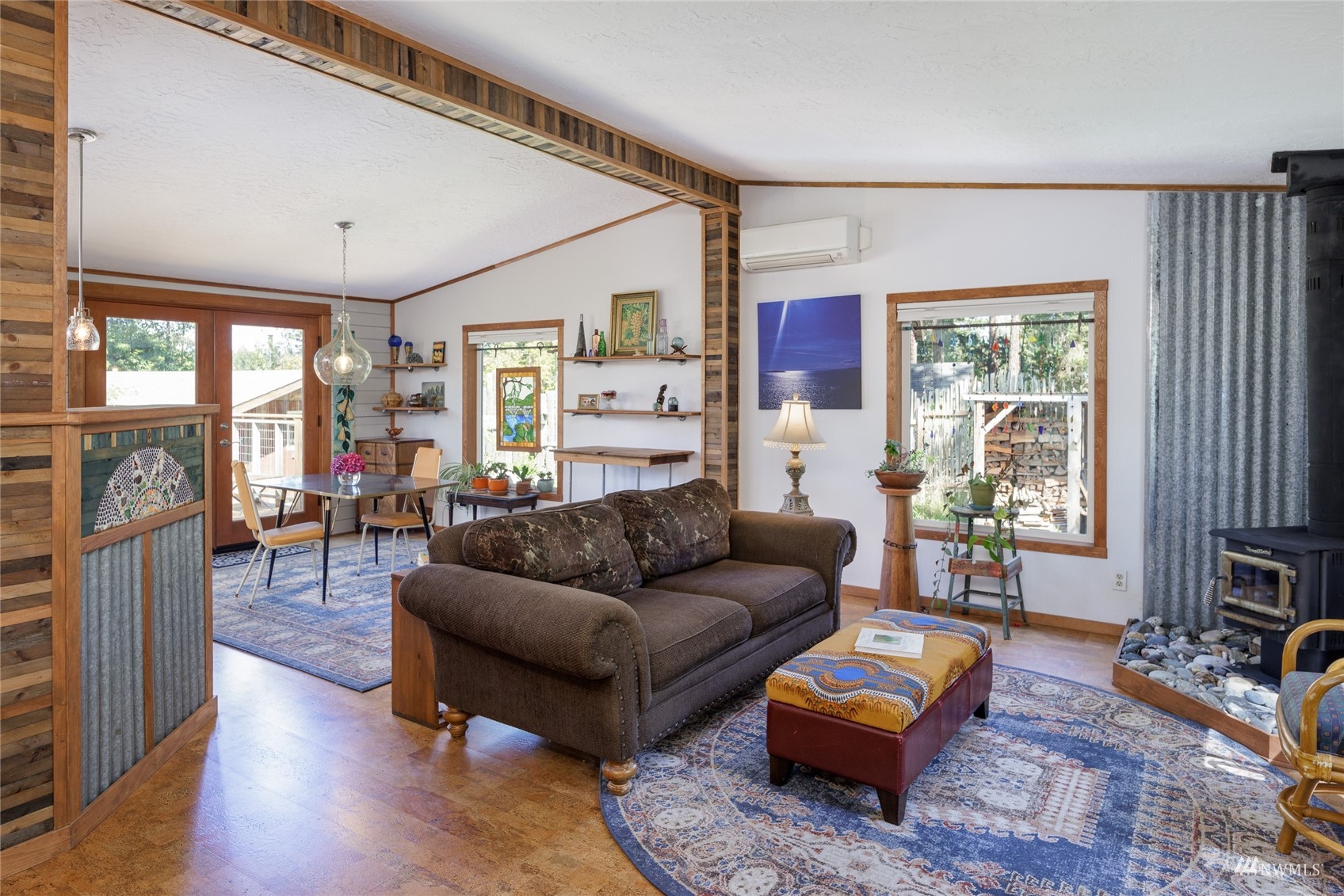 268 Wren Road Lopez Island, WA 98261 - Photo 2 of 23 a living room with furniture and a flat screen tv