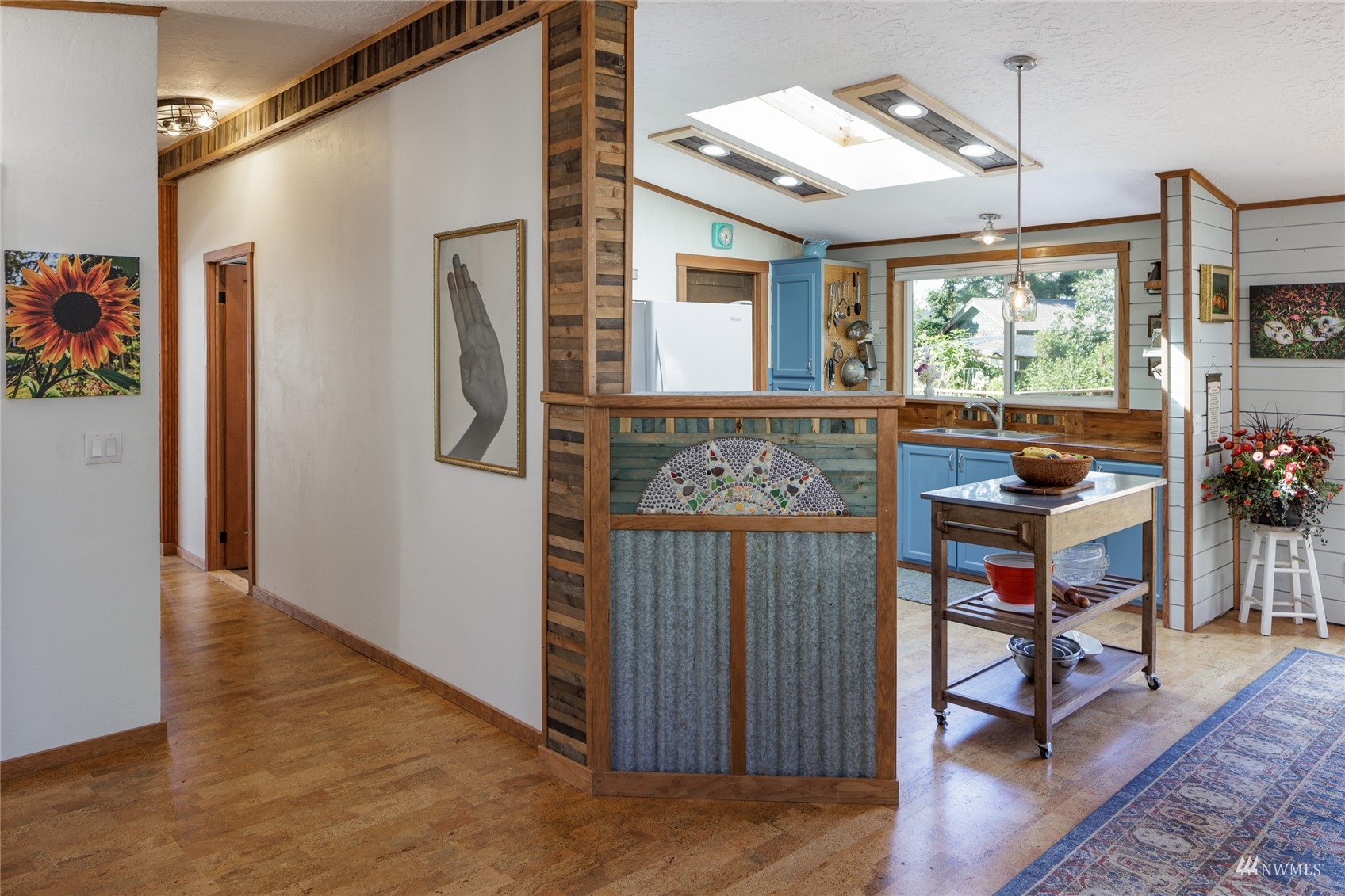 268 Wren Road Lopez Island, WA 98261 - Photo 4 of 23 a view of entryway with wooden floor and furniture