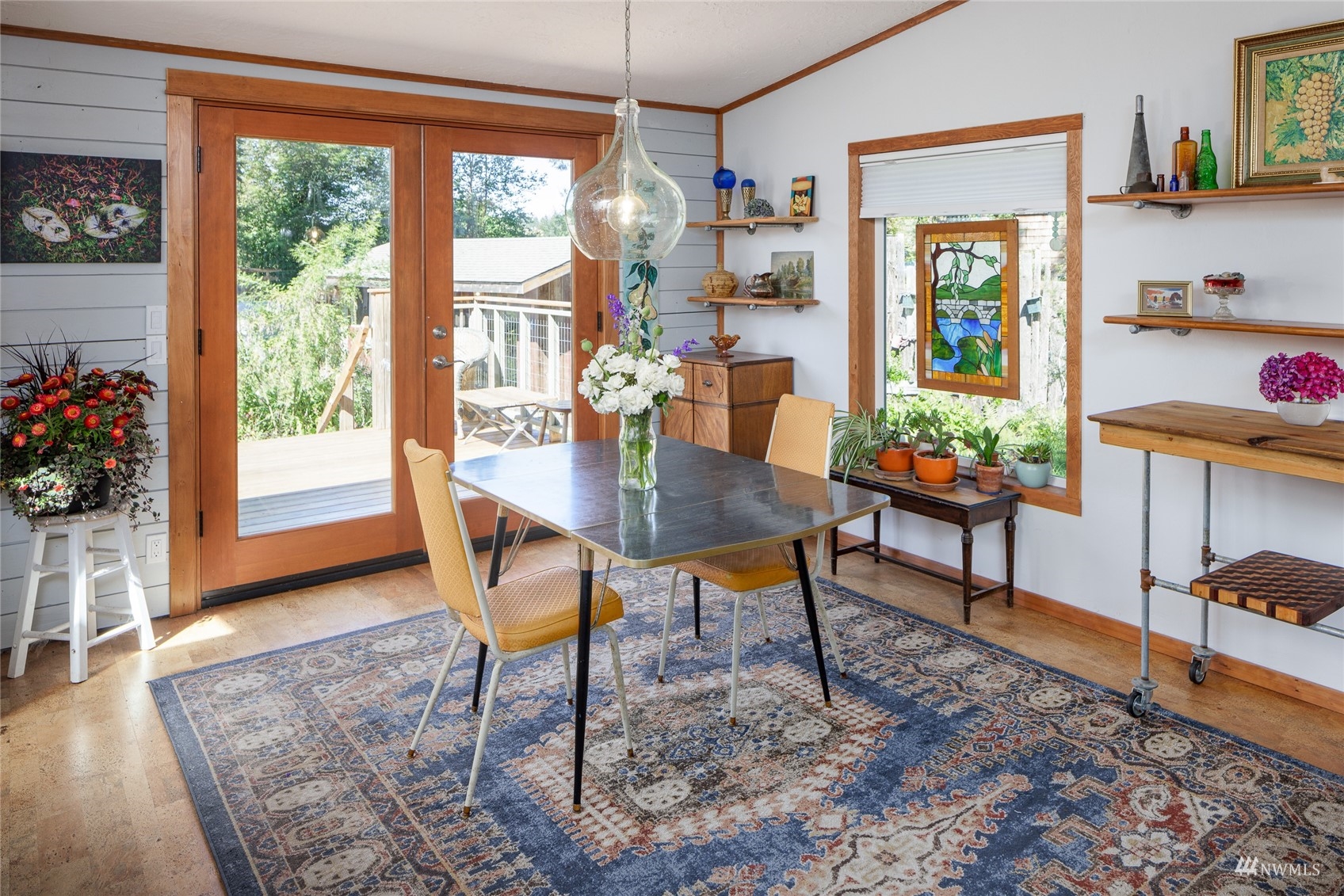 268 Wren Road Lopez Island, WA 98261 - Photo 5 of 23 a dining room with furniture window and wooden floor
