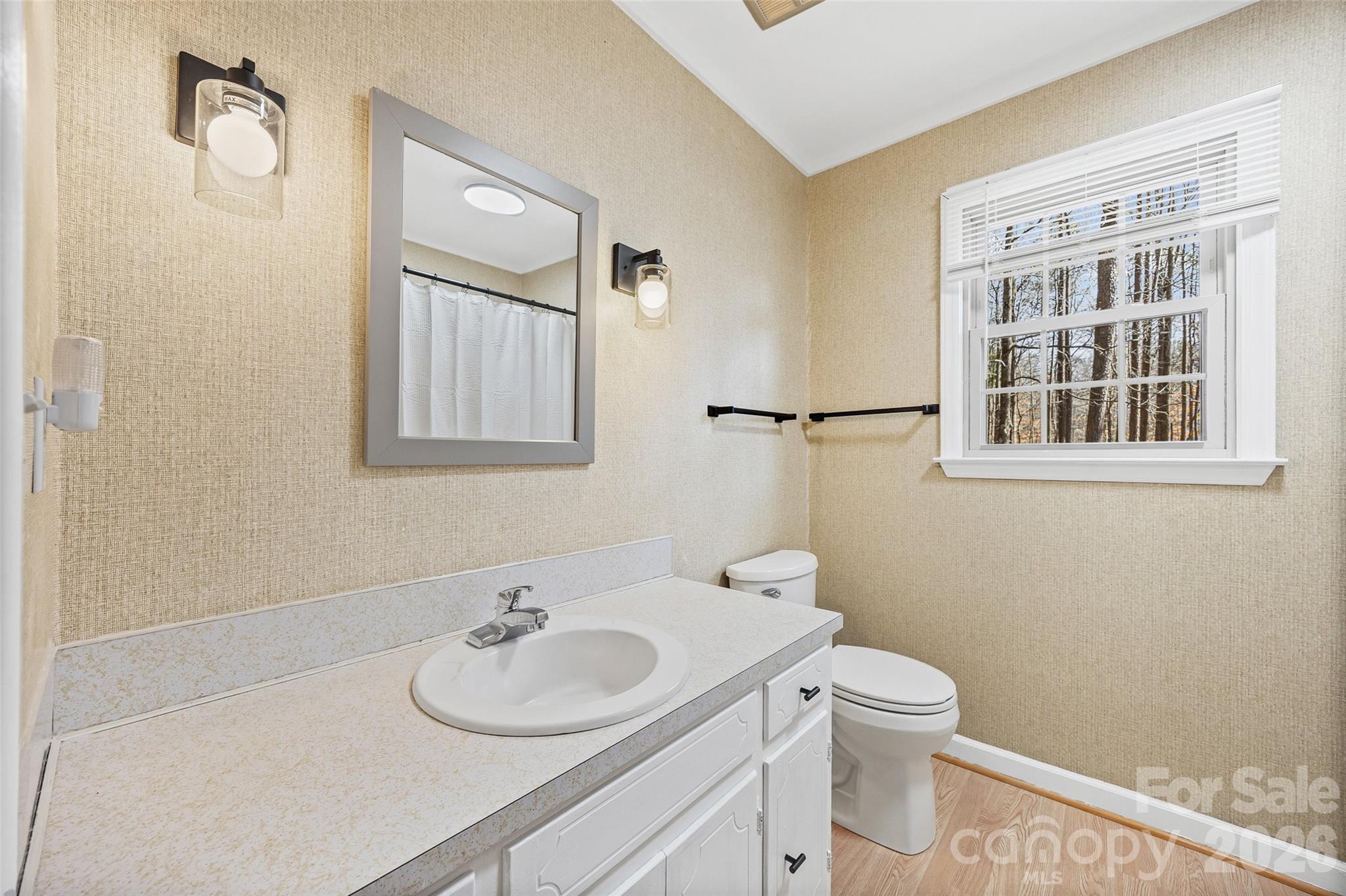 405 Bratton Avenue York, SC 29745 - Photo 31 of 43 a bathroom with a granite countertop sink toilet and mirror