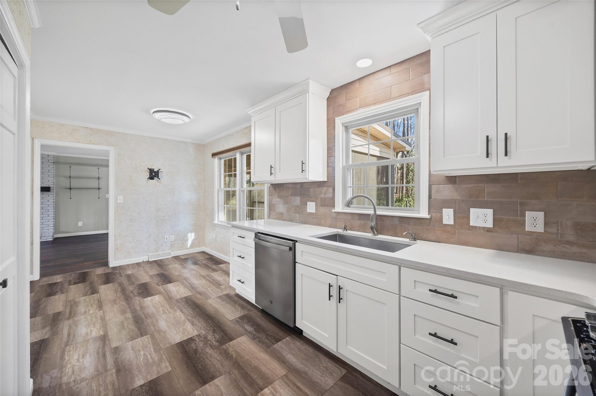405 Bratton Avenue York, SC 29745 - Photo 8 of 43 a kitchen with granite countertop white cabinets and white appliances