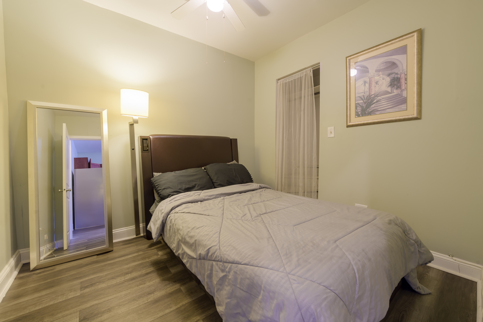 2436 West Fillmore Street Chicago, IL 60612 - Photo 11 of 44 a bedroom with a bed and a painting