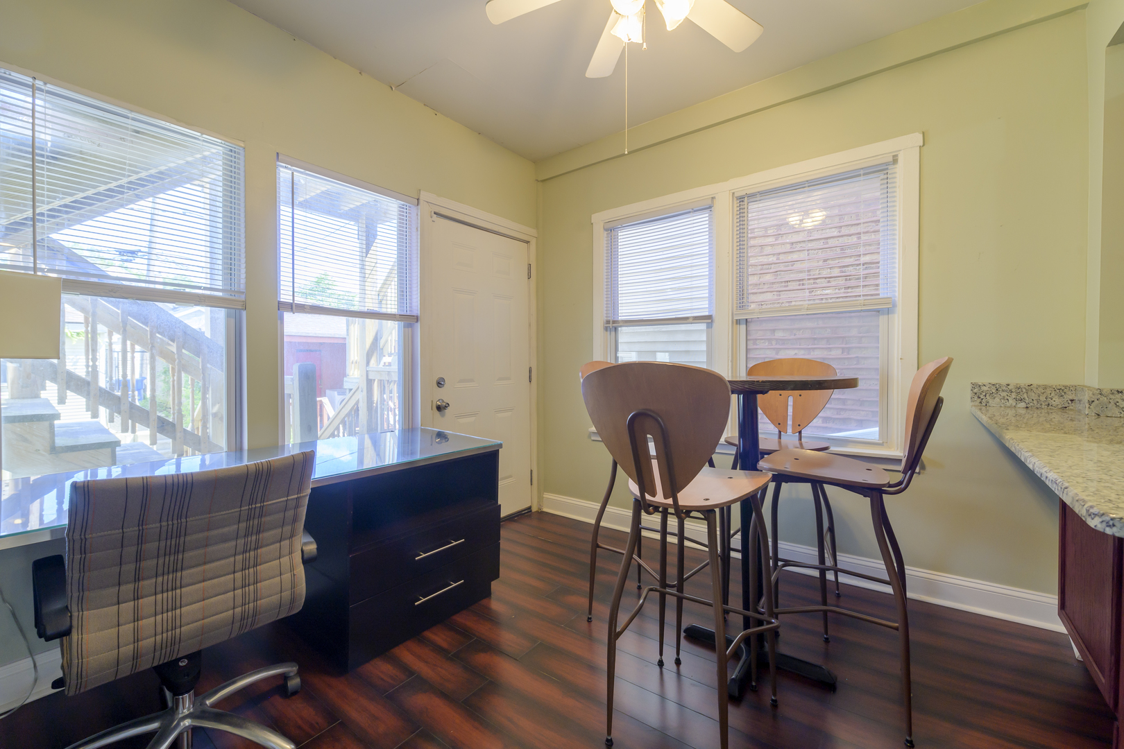 2436 West Fillmore Street Chicago, IL 60612 - Photo 16 of 44 a view of a dining room with furniture window and wooden floor