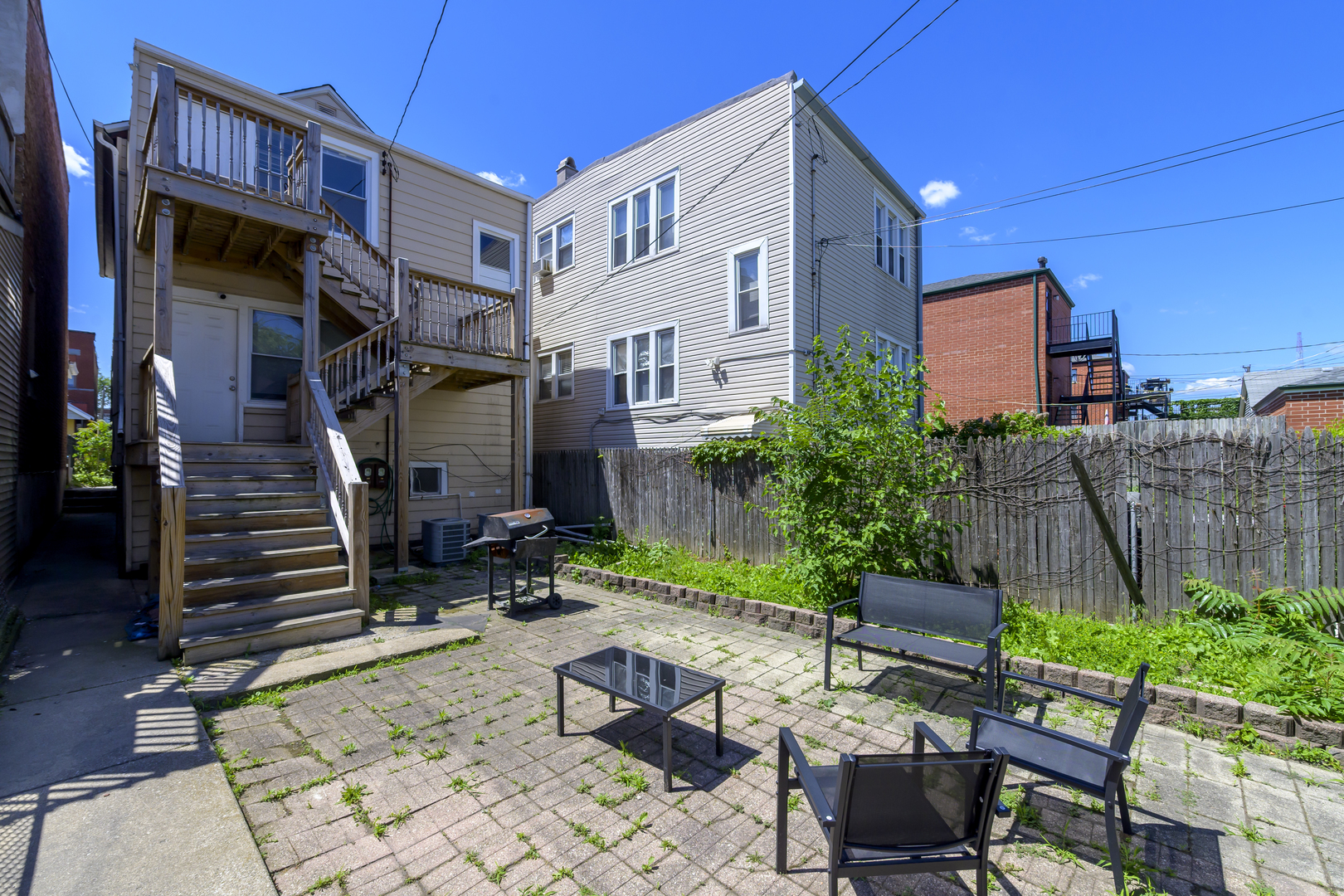 2436 West Fillmore Street Chicago, IL 60612 - Photo 39 of 44 a backyard of a house with seating space