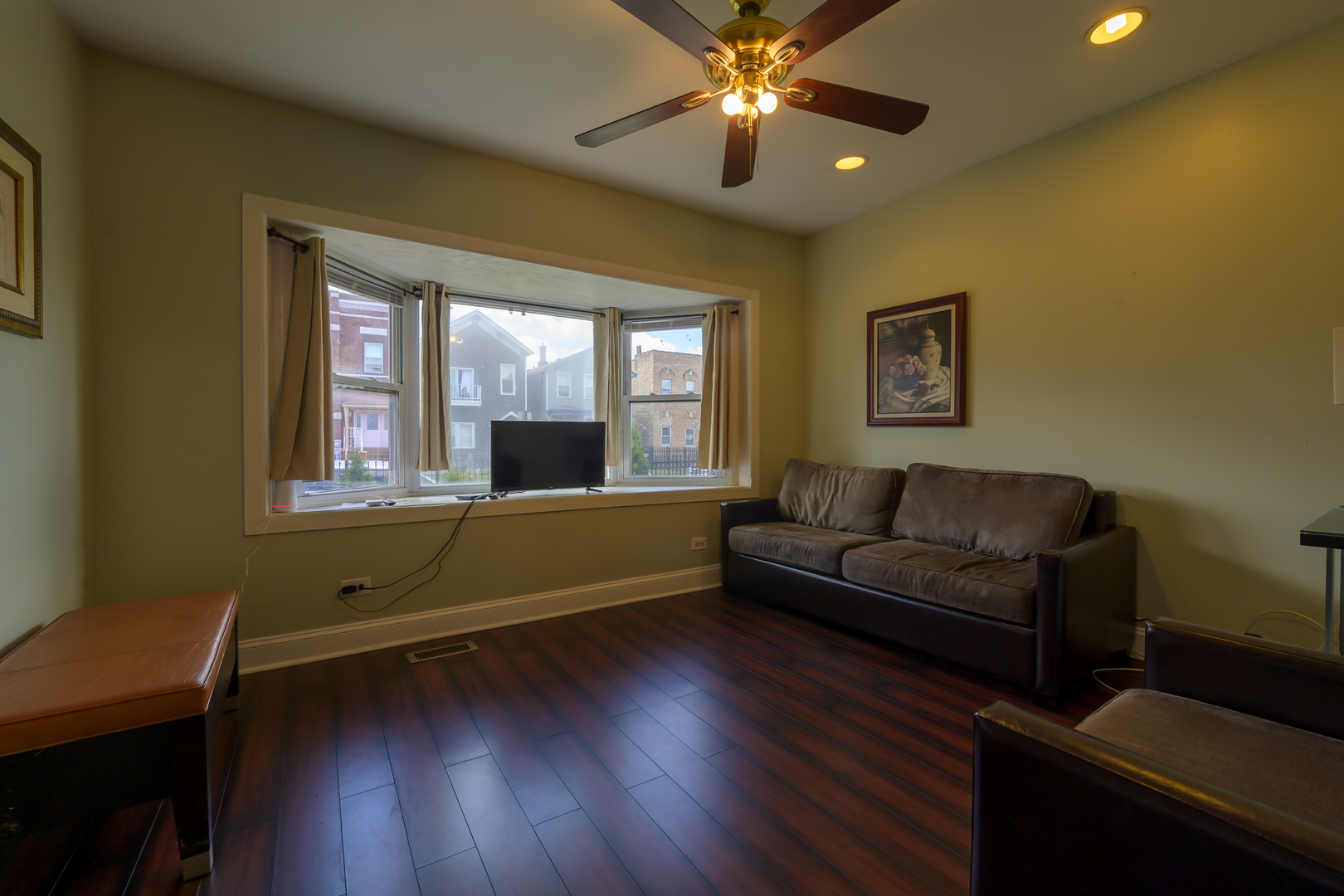 2436 West Fillmore Street Chicago, IL 60612 - Photo 4 of 44 a living room with furniture and a large window