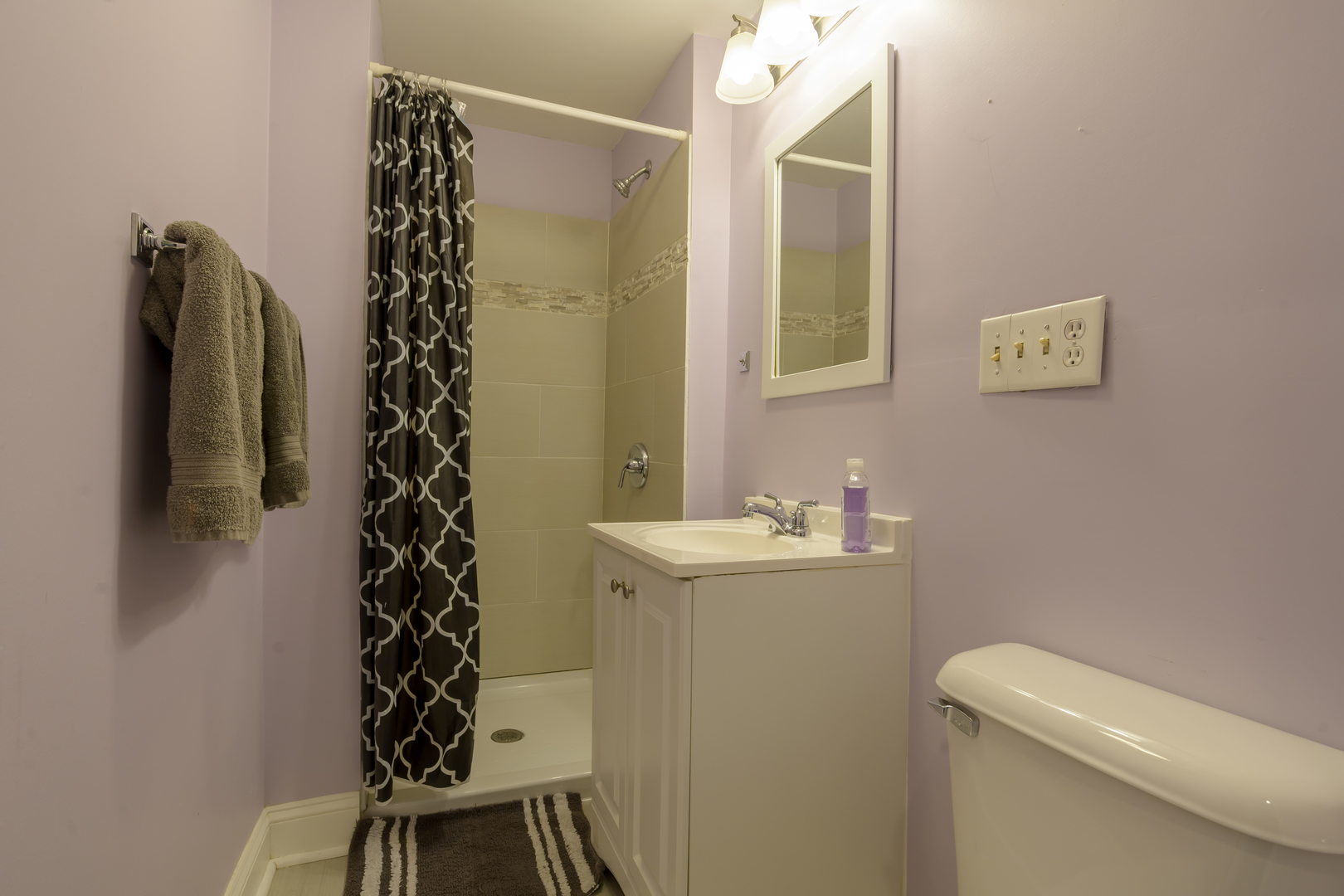 2436 West Fillmore Street Chicago, IL 60612 - Photo 8 of 44 a bathroom with a shower toilet and sink