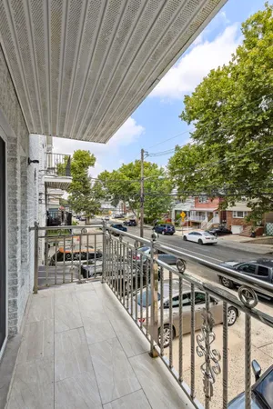 a view of a balcony with city view