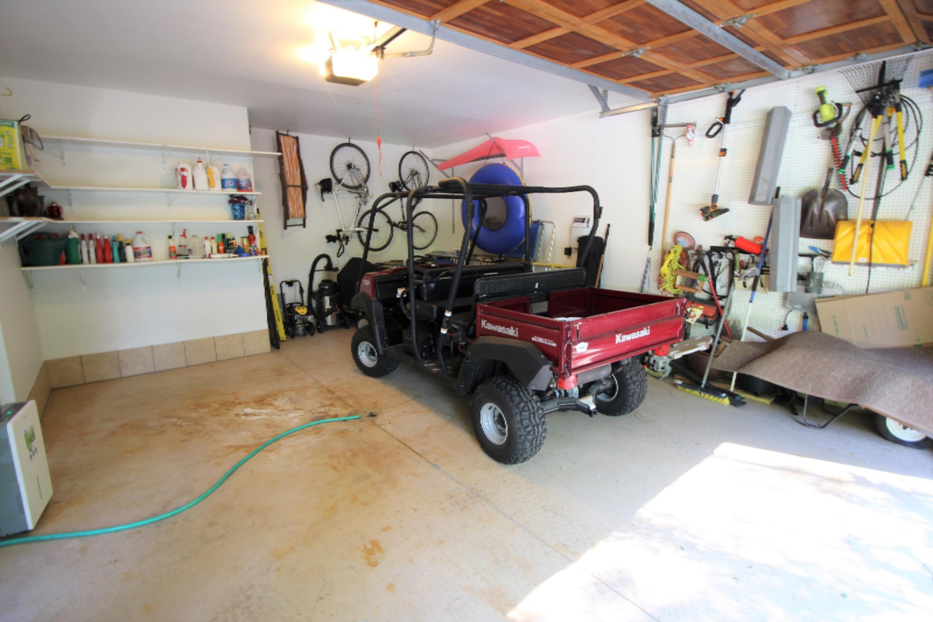 1001 Ravine Road South Haven, MI 49090 - Photo 37 of 52 1. garage interior & Kawasaki Mule