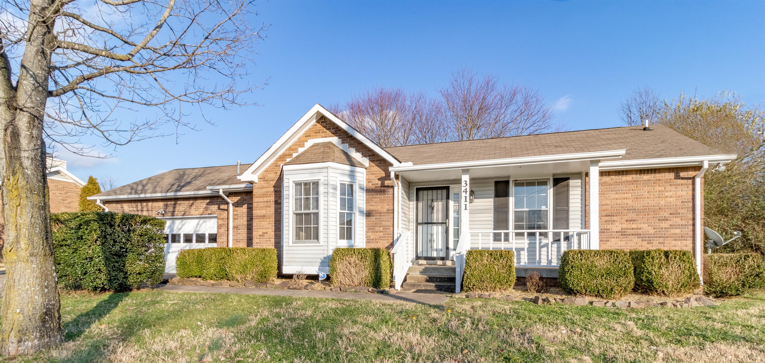 3411 Polly Drive Clarksville, TN 37042 - Photo 1 of 20 a view of residential houses with yard and wooden fence