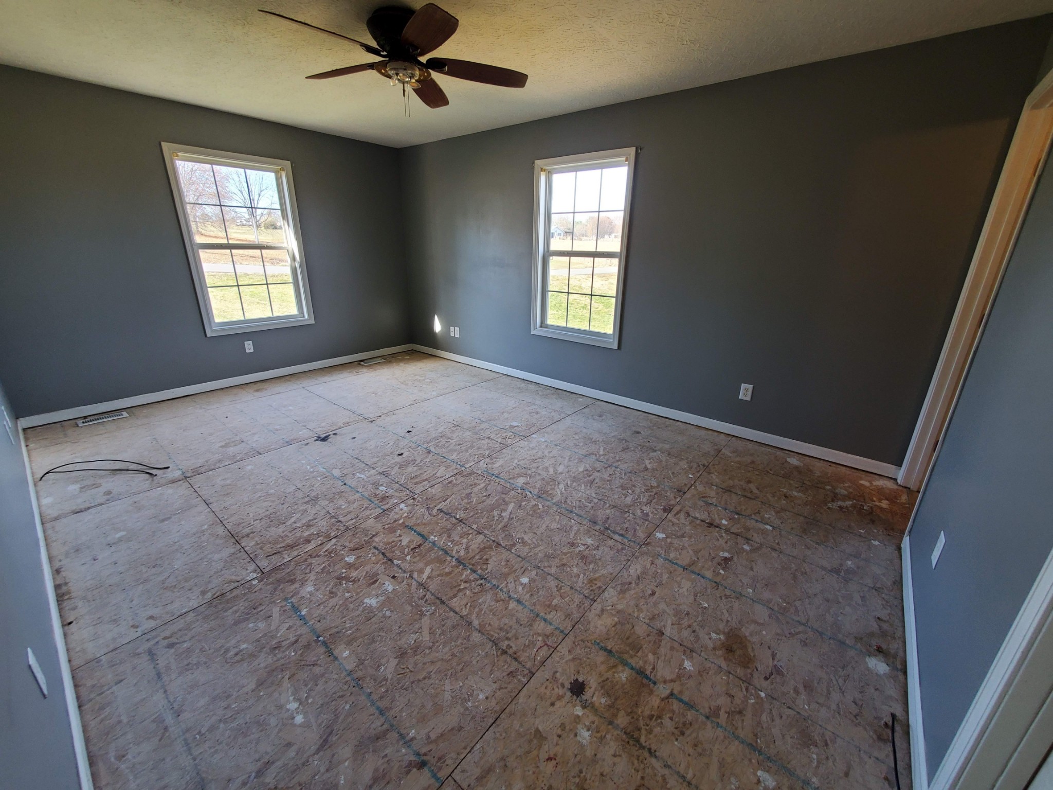 573 Womack Road Bethpage, TN 37022 - Photo 12 of 21 a view of an empty room with a window