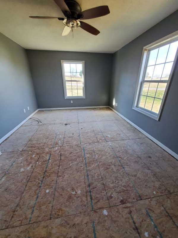 573 Womack Road Bethpage, TN 37022 - Photo 13 of 21 a view of an empty room with a window